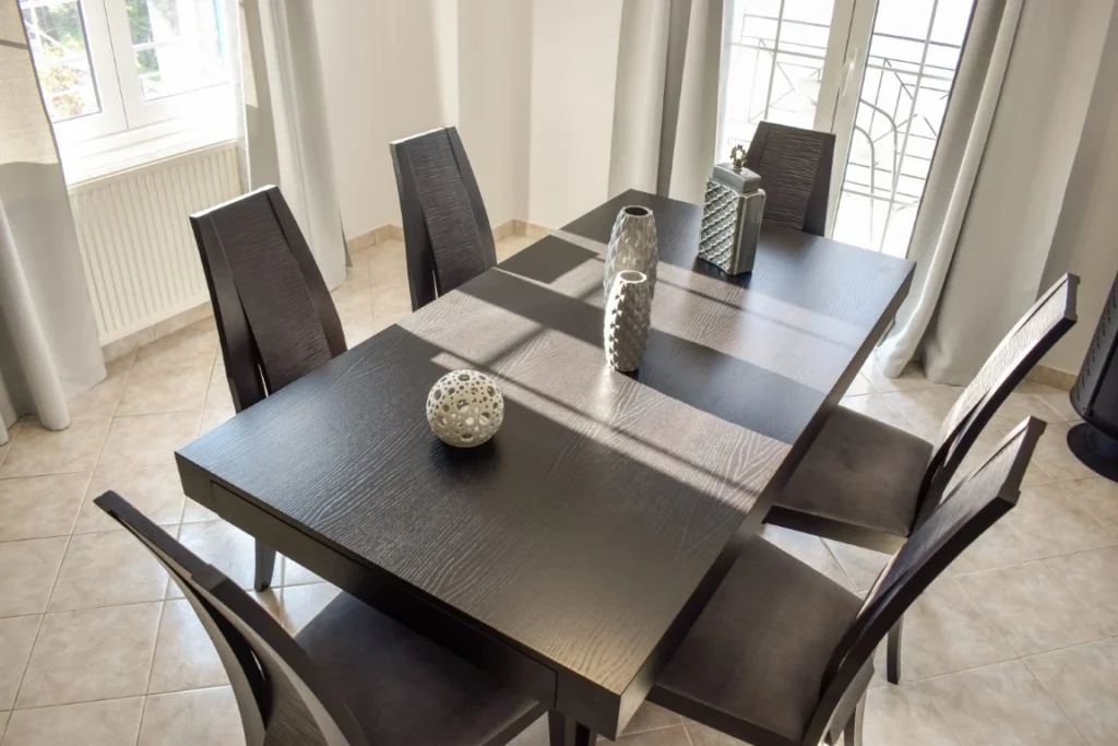 Bright living room area with large windows ofAthos apartment