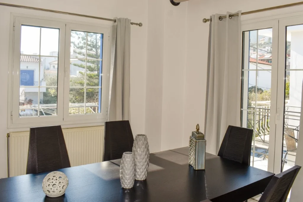 Dining table set for four guests in Athos apartment