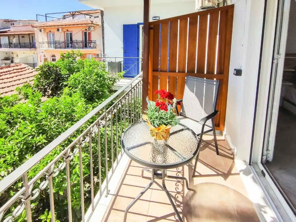 Balcony with garden view — Athos Apartments Skiathos